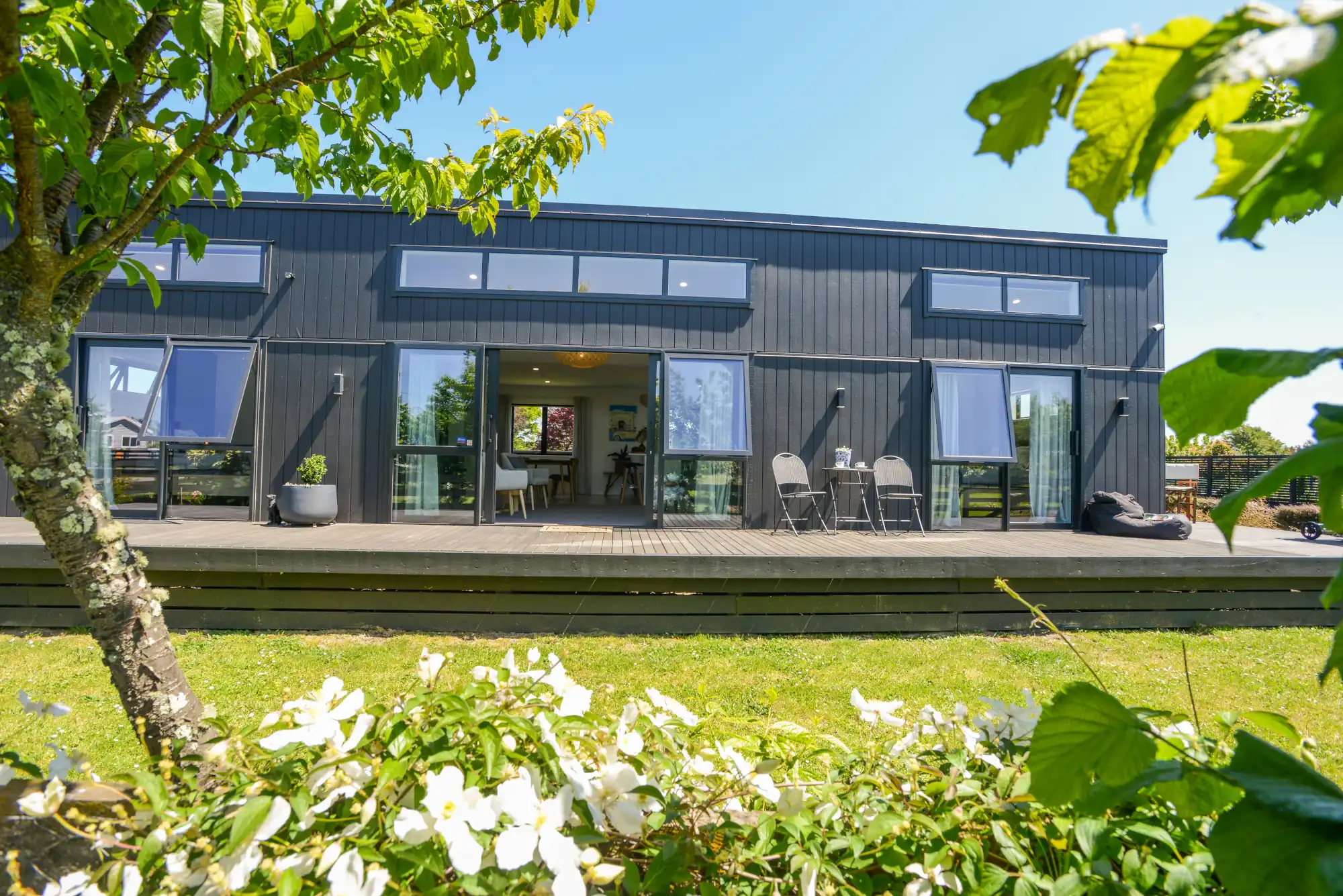 the homestay with flower garden in foreground